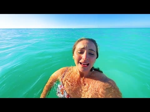 Woman Suddenly Surrounded by Sharks